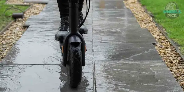 riding my electric scooter in the rain